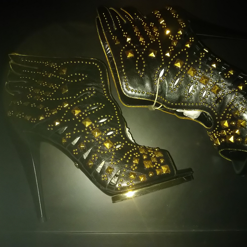 Peep Toe booties embellished leather boots.